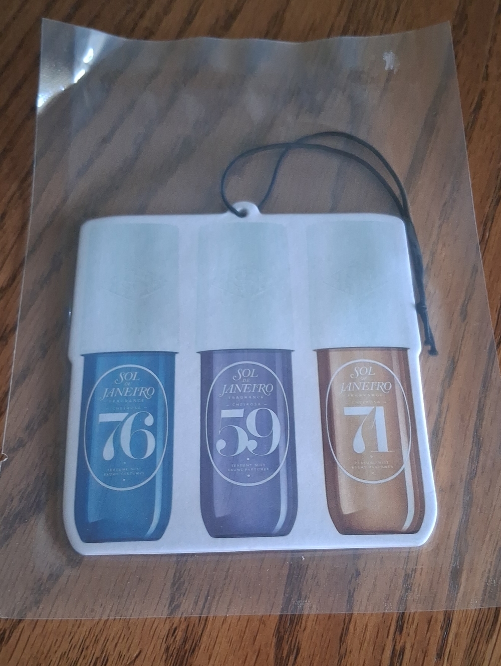 Sol de Janeiro Hanging Car Freshener with Blue, Purple, Gold Jar Graphics